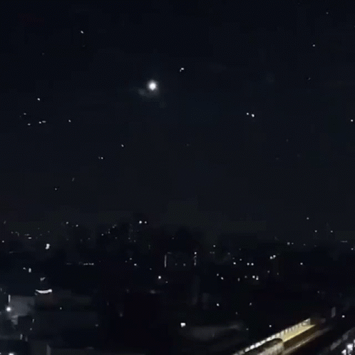 a bunch of fireworks are going off in the sky