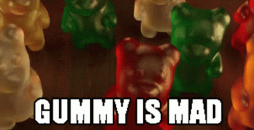 A Bunch Of Gummy Bears With The Words Gummy Is Mad On The Bottom GIF