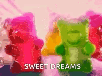 A Bunch Of Gummy Bears With The Words `` Sweet Dreams '' Written On Them GIF