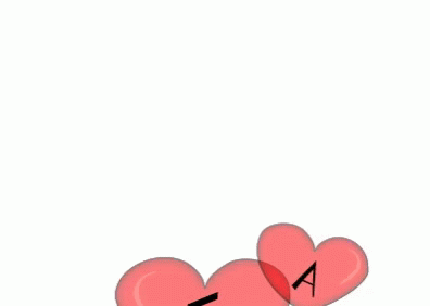 A Bunch Of Heart Shaped Balloons With The Letters T E A And M Written On Them GIF