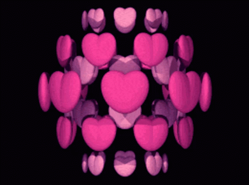 A Bunch Of Pink Hearts Are Stacked On Top Of Each Other On A Black Background GIF