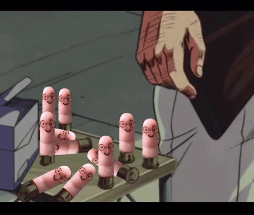 A Bunch Of Pink Pills With Faces On Them Are Sitting On A Table GIF