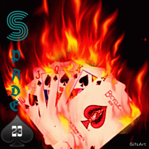a bunch of playing cards are on fire with the number 23 on the bottom