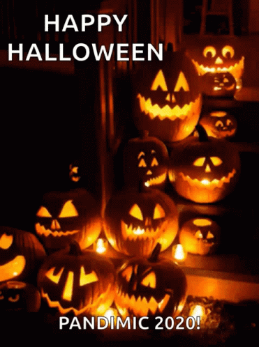 A Bunch Of Pumpkins Are Lit Up With The Words Happy Halloween Pandemic 2020 On The Bottom GIF