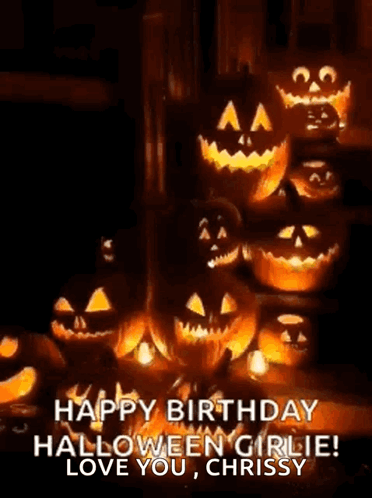 A Bunch Of Pumpkins With Faces Carved Into Them Are Sitting On Top Of Each Other . GIF