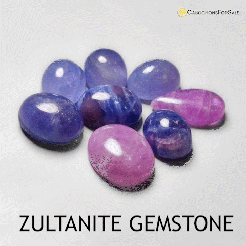 A Bunch Of Purple And Blue Stones With The Words Zultanite Gemstone GIF