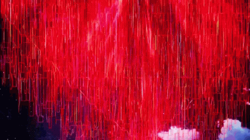 a bunch of red lights are coming out of the sky