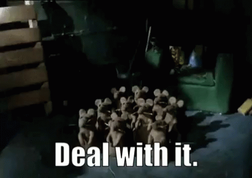 A Bunch Of Stuffed Mice Are Standing Around A Green Chair And Couch . GIF