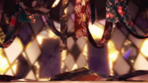 A Bunch Of Ties Are Hanging On A Shelf In A Room . GIF