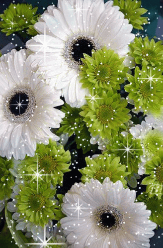 A Bunch Of White Flowers And Green Flowers Are Surrounded By Sparkles . GIF
