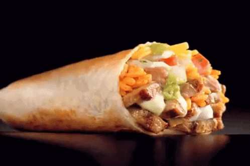 A Burrito With Meat And Vegetables On A Black Background GIF