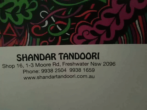 A Business Card For Shandaar Tandoori Has A Phone Number GIF