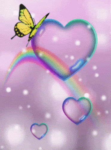 a butterfly sits on a heart shaped soap bubble