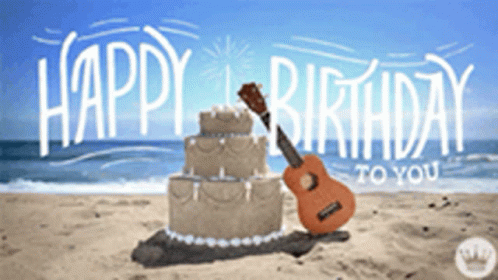 A Cake And Guitar On The Beach With The Words Happy Birthday To You GIF