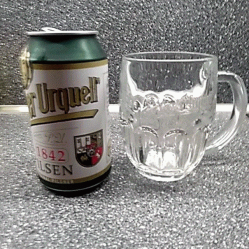 A Can Of Pilsen Beer Sits Next To A Mug GIF