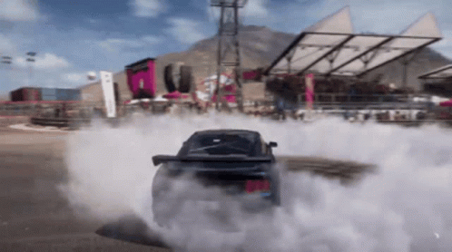 a car is drifting in a video game and smoke is coming out of it