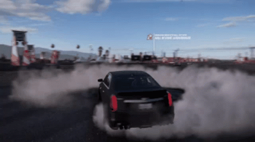 A Car Is Drifting In A Video Game With A Sign That Says " Roll Of Fame " On It GIF