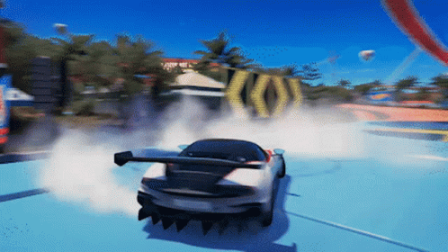A Car Is Drifting On A Track With A Sign That Says ' X ' On It GIF