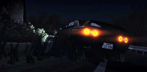 A Car With A License Plate That Says 32-34 Is Driving Down A Dark Road GIF