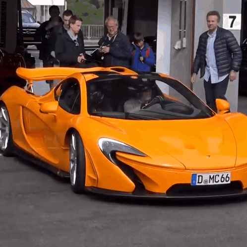 A Car With A License Plate That Says Dmc66 GIF