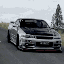 A Car With A License Plate That Says " I Demon " GIF