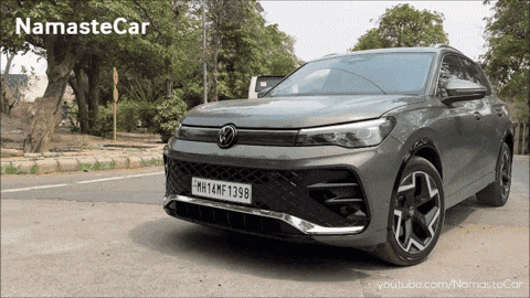 A Car With A License Plate That Says Mh14nf 1298 GIF