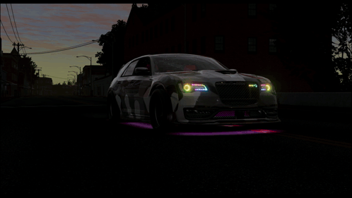 A Car With Purple And Green Lights On The Front GIF