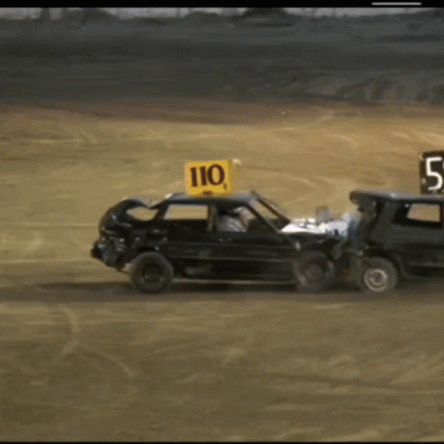 A Car With The Number 110 On The Top Of It GIF