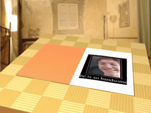 A Card With A Picture Of A Man And The Words He Is So Handsome On It GIF