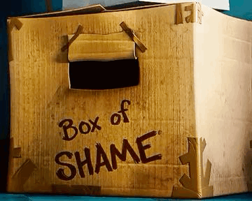 A Cardboard Box With The Words Box Of Shame Painted On It GIF