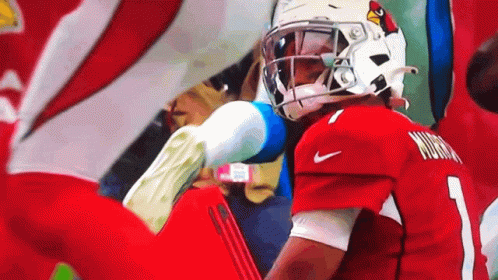 A Cardinals Football Player Wearing A Red Jersey With The Number 1 On It GIF