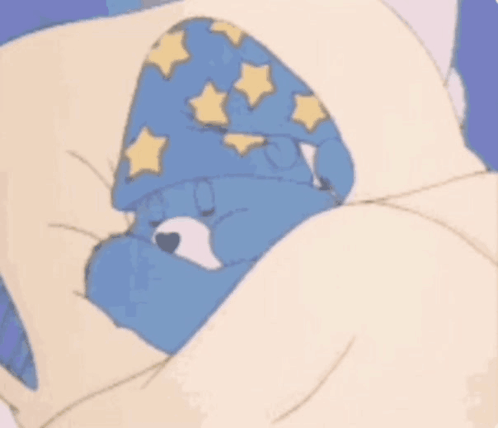 A Care Bear Is Sleeping In A Bed With The Words Sweet Dreams Above Him GIF