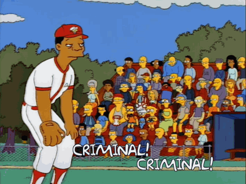 A Cartoon Baseball Player Stands In Front Of A Crowd And Says Criminal GIF