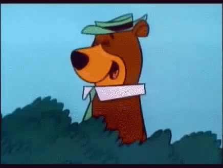 A Cartoon Bear Is Wearing A Hat And Tie . GIF