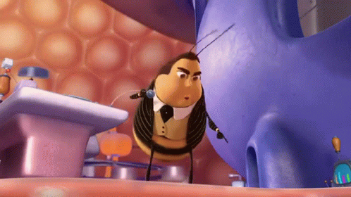 A Cartoon Bee Wearing A Tuxedo And Bow Tie Is Standing Next To A Purple Object GIF