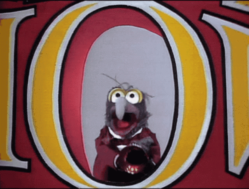A Cartoon Bird Is Looking Through A Hole In A Sign That Says 101 GIF