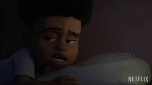 A Cartoon Boy Is Sleeping In A Bed With His Eyes Closed And A Netflix Logo In The Corner GIF