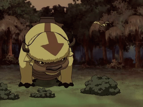 A Cartoon Buffalo With An Arrow On Its Head GIF