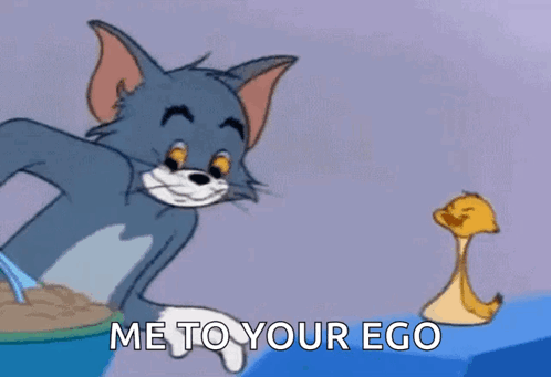 A Cartoon Cat Is Holding A Spoon In Front Of A Duck . GIF
