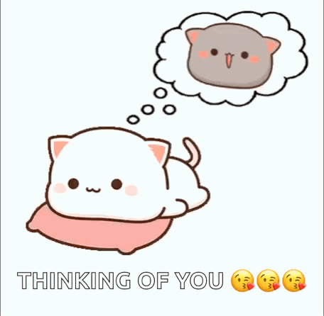 A Cartoon Cat Is Laying On A Pillow Thinking Of Another Cat . GIF