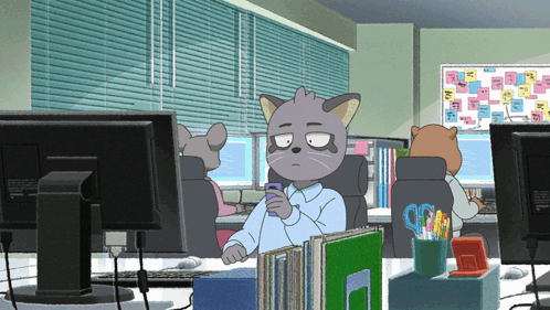 A Cartoon Cat Is Sitting At A Desk With A Cell Phone In His Hand GIF