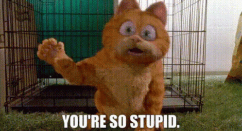 A Cartoon Cat Is Standing In Front Of A Cage With The Words `` You 'Re So Stupid '' Written Below It . GIF
