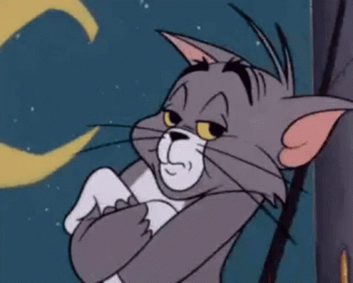 A Cartoon Cat Is Standing Next To A Tree With His Arms Crossed And A Crescent Moon In The Background . GIF