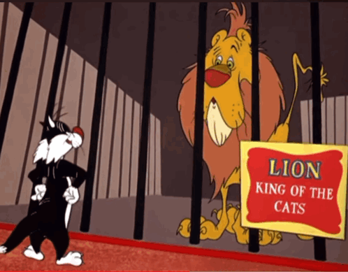 A Cartoon Cat Stands In Front Of A Lion In A Cage GIF