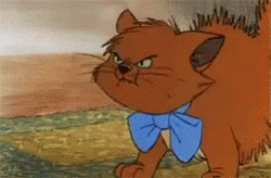 A Cartoon Cat Wearing A Blue Bow Tie Has An Angry Look On Its Face GIF