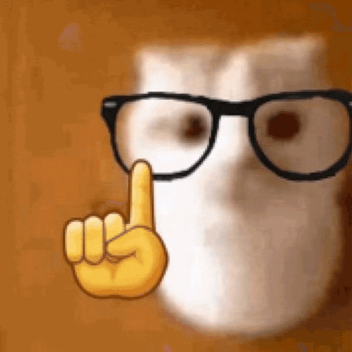 A Cartoon Cat Wearing Glasses Is Giving A Thumbs Up Sign . GIF