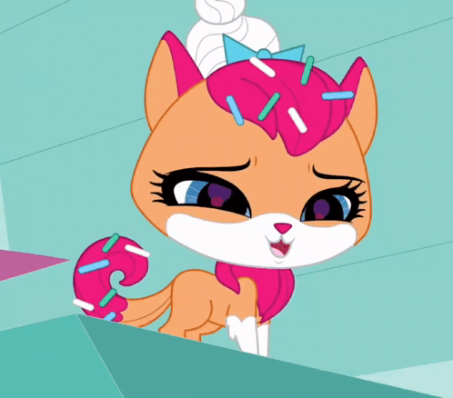 A Cartoon Cat With A Donut On Its Head With Sprinkles GIF