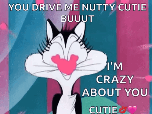 A Cartoon Cat With A Heart In Its Mouth Says " You Drive Me Nutty Cutie Buuut I 'M Crazy About You " GIF
