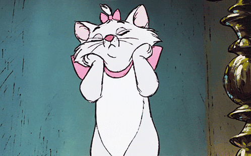 A Cartoon Cat With A Pink Bow On Her Neck GIF