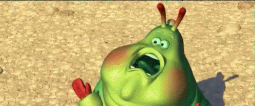 A Cartoon Caterpillar With Its Mouth Open And Red Ears GIF